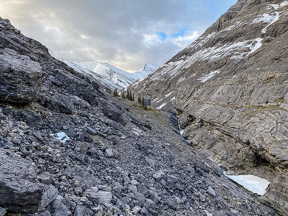 Following a goat highway up the NW access valley.