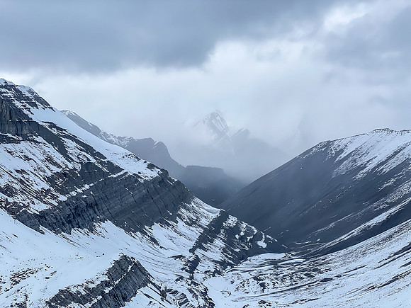 Swirling clouds over Canary and Wingnut Peaks.