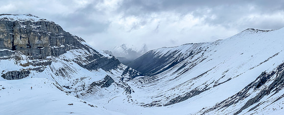 Swirling clouds over Canary and Wingnut Peaks.