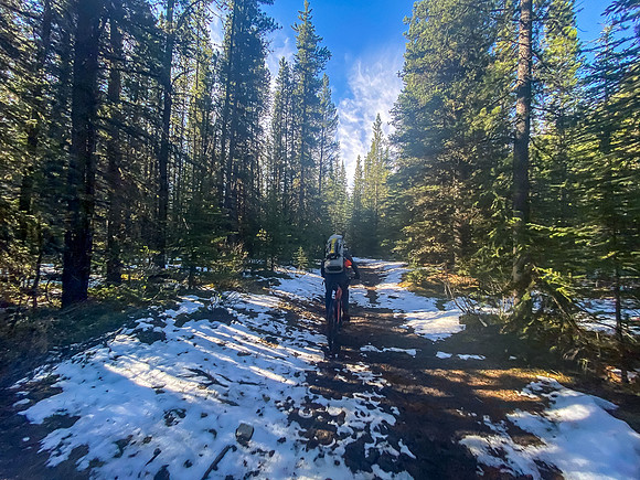 Biking in fresh snow on the South Ram River Trail.