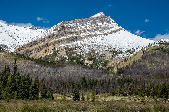 Wingnut Peak rises over the South Ram Patrol Cabin.