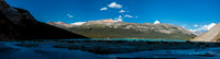 Bow Lake shimmers in the distance.