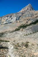 Looking up at Portal Peak from the Bow Glacier Falls trail. You can spot the small waterfall that I aimed for by the highest patch of greenery on the right.