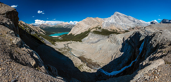 Bow Glacier Falls running its course to Bow Lake in the distance.