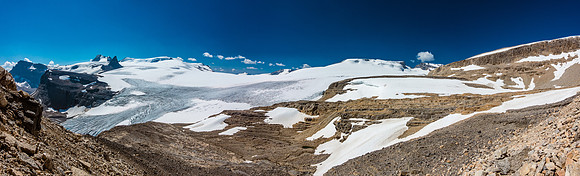 View from just around the corner of the "staircase" traverse, looking over the main Wapta Icefield with St. Nich and Olive on the left and Rhondda and Habel on the right.