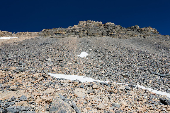From here you should either climb up on climber's right via Ben and Steven's route, or climber's left, just by the right edge of that upper snow patch