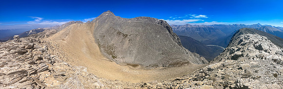 Traversing from the upper SW face to the top of the SE ridge.