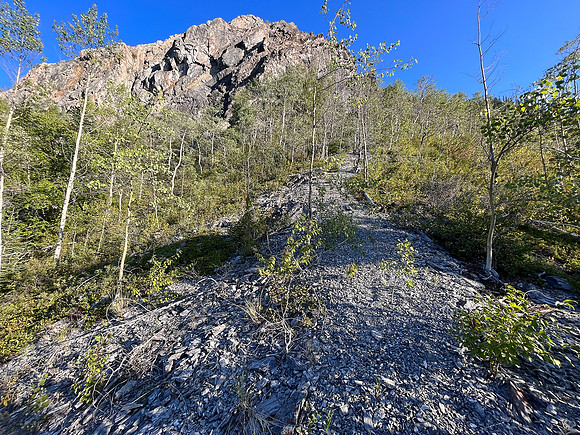 Traversing south slopes to the SE ascent gully.
