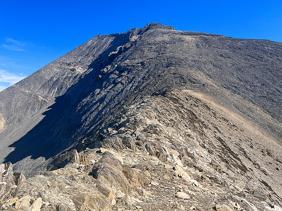Traversing from the top of the SE ridge to the upper SW face of Wardle.