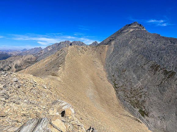 Traversing from the top of the SE ridge to the upper SW face of Wardle.