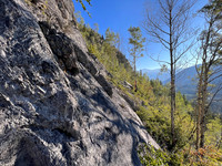 Traversing south slopes to the SE ascent gully.