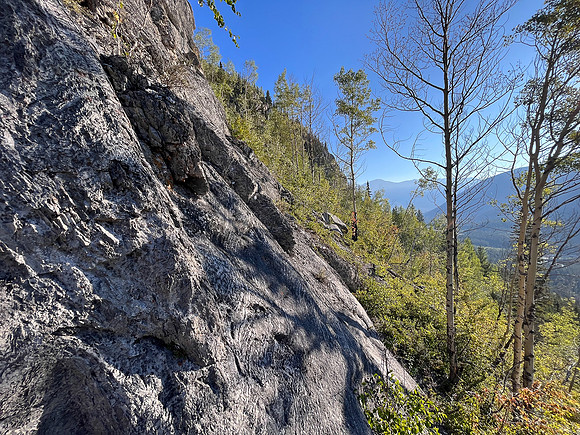 Traversing south slopes to the SE ascent gully.