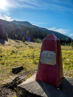 A border marker at Simpson Pass.