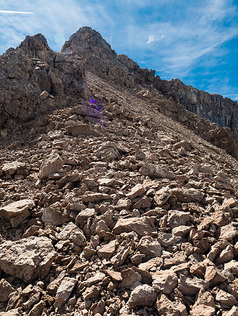 Looking up the very loose and steep north ridge of The Monarch from where I topped out from the scree bowl.