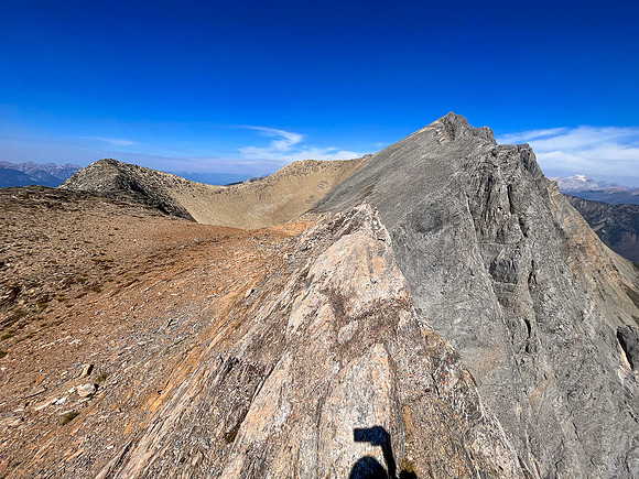 Traversing from the upper SW face to the top of the SE ridge.