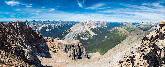 Another look back as I gain the north ridge - Phil just visible at the base of the scree slope breaking the cliffs at lower left.