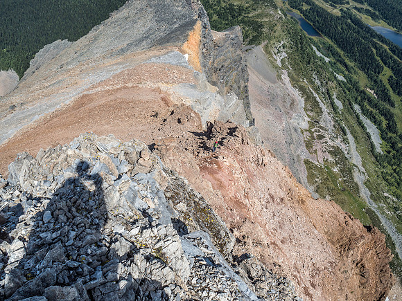 Looking down at Wietse from the north ridge - letting him know that I've set up cairns to help guide them around (L) and up to my current position.