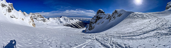 Skiing the north glacier from the Chimney Col (R).
