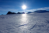 An icy glacier - wind hammered and fast travel.