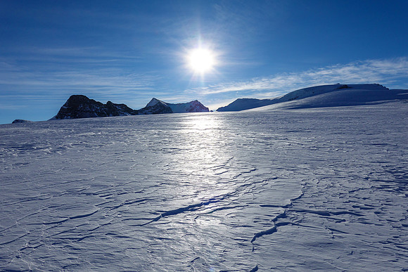 An icy glacier - wind hammered and fast travel.