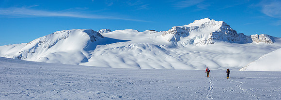 Skiing down to the western plateau under Mount Collie.
