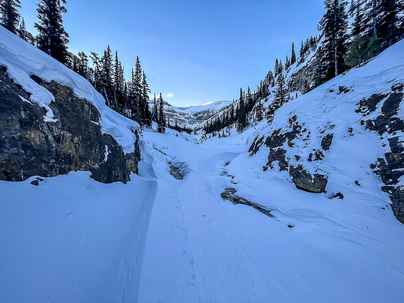 Skiing the canyon under Vulture Peak.