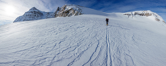 Skiing to the NE access slope.