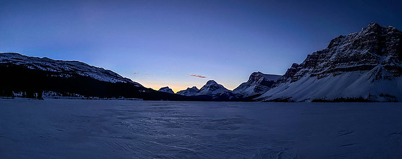 Crossing Bow Lake in predawn light.