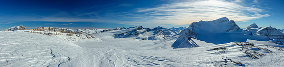 Summit views back over the Wapta Icefield include (L to R), Habel, Rhondda, Crowfoot, St. Nicholas, Olive, Gordon, Collie and des Poilus (R).