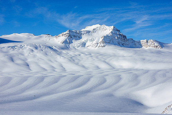 Skiing down to the western plateau under Mount Collie.