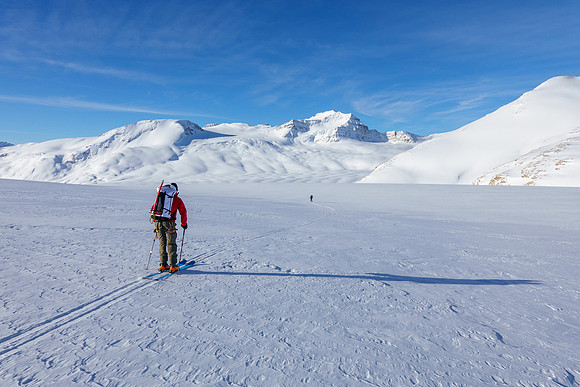 Skiing down to the western plateau under Mount Collie.