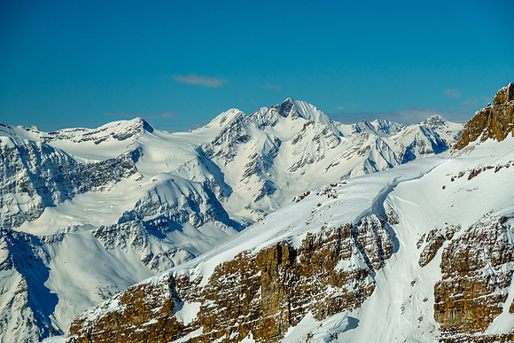 Mount Low and Whiteaves in front of Solitaire Mountain.