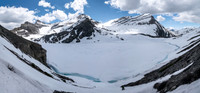 Still traversing the lake - note the cliff bands on the L that you must traverse above. Coleman at center here.