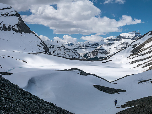 Heading up a snow gully to the pass.