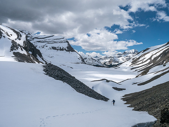 Heading up a snow gully to the pass.