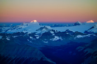 Mount Columbia and the Twins catch first light.