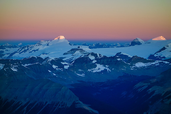 Mount Columbia and the Twins catch first light.