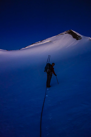 We angled up easy slopes to the col just left of center and then dumped our gear and scrambled to the summit on the right.