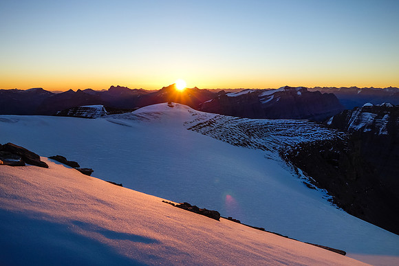 Looking back over our bivy site as the sun rises over Mount Cline.