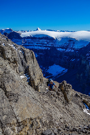 Eric comes up the rock rib beside the gully that offered a bypass to the cliff blocking it higher up near the summit plateau.