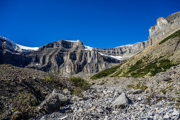 The curtain wall that foils easy access to the upper mountain is visible in the center of this photo. We ascended hard scree slopes to the right (out of sight here).