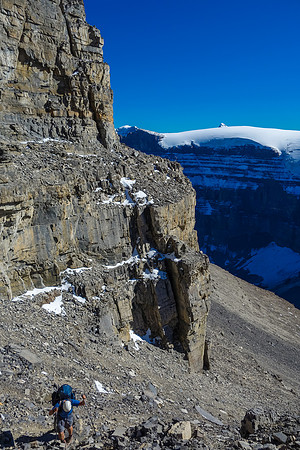 Eric starts up the final gully breaking through the upper cliff band.