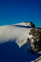 Eric makes his way onto the Monchy icefield from the descent ridge of Amery.