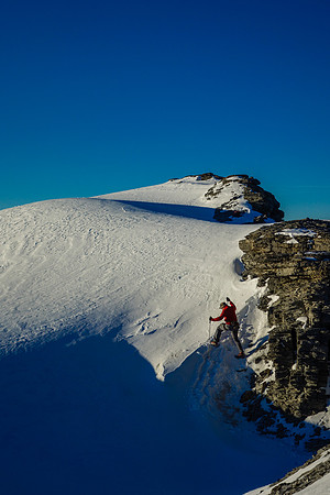 Eric makes his way onto the Monchy icefield from the descent ridge of Amery.