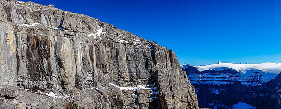 The upper cliff band is pretty much impenetrable accept for a few steep gullies / couloirs.