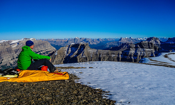 Vern takes in the awesome views from his bivy site. Murchison, Wilson, Sarbach, Chephren, White Pyramid, Howse and Erasmus