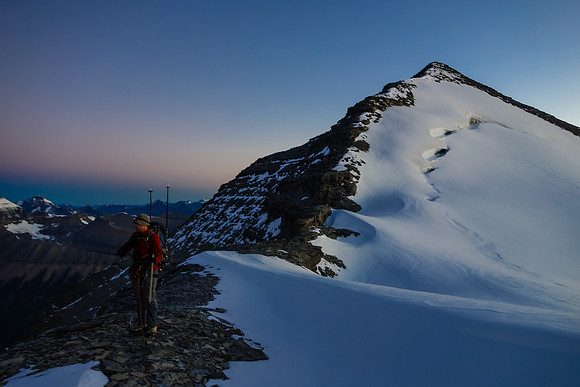 Eric at the col - Amery rising behind him.