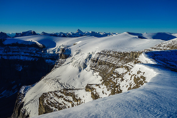 An icefall carves off the Monchy Icefield.