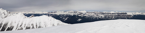 A view north off the summit includes the entire Castle Mountain massif from Armor and Protection on the left to Castle Peak on the right.