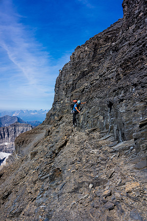 Little ledges are the key to working your way down the face, traversing back and forth breaks the many cliff bands.